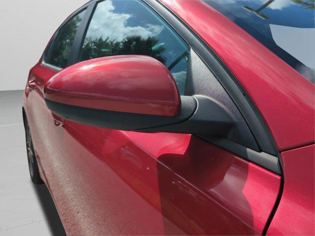 Photo of 2023 Currant Red Kia Forte
