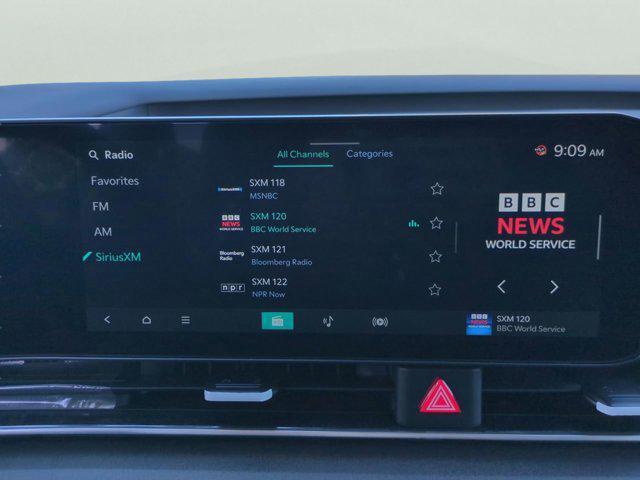 Photo of 2026 Snow White Pearl Kia Carnival Hybrid