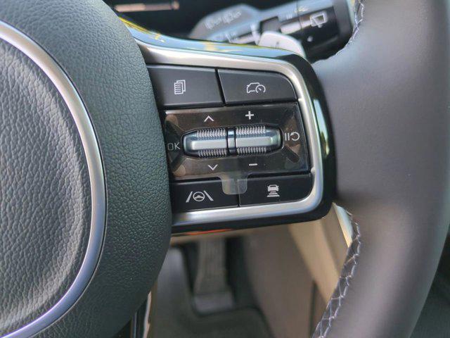 Photo of 2026 Snow White Pearl Kia Carnival Hybrid