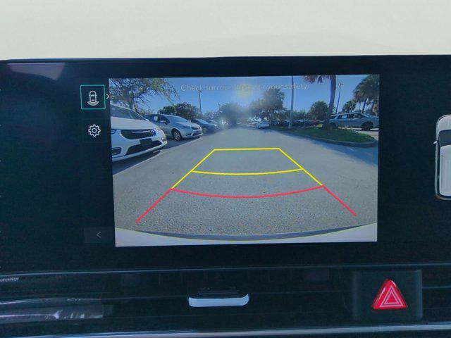 Photo of 2026 Snow White Pearl Kia Carnival Hybrid