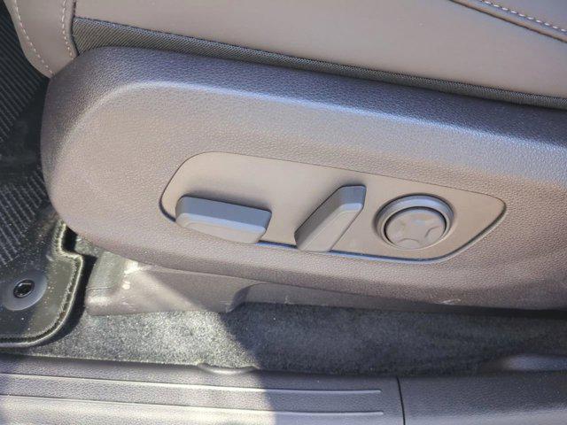 Photo of 2026 Snow White Pearl Kia Carnival Hybrid