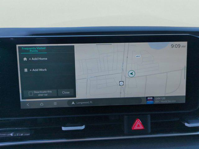 Photo of 2026 Snow White Pearl Kia Carnival Hybrid