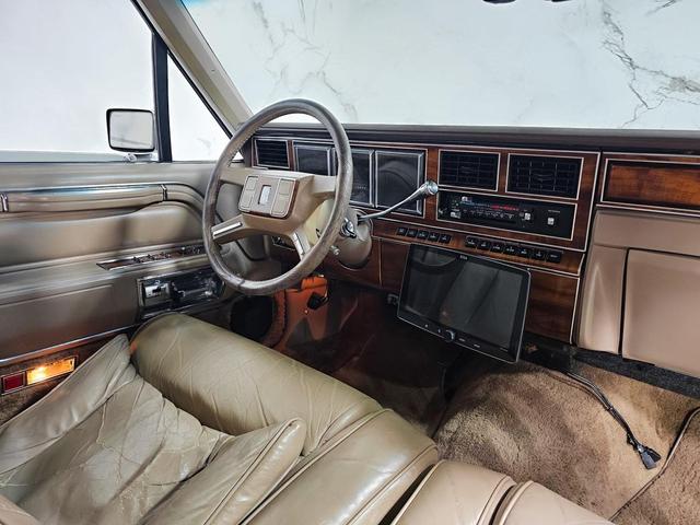 Photo of 1989 Tan Lincoln Town Car