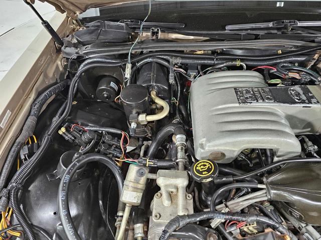 Photo of 1989 Tan Lincoln Town Car