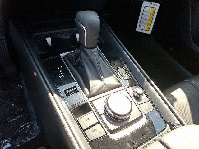 Photo of 2025 Soul Red Crystal Metallic Mazda CX-50 Hybrid