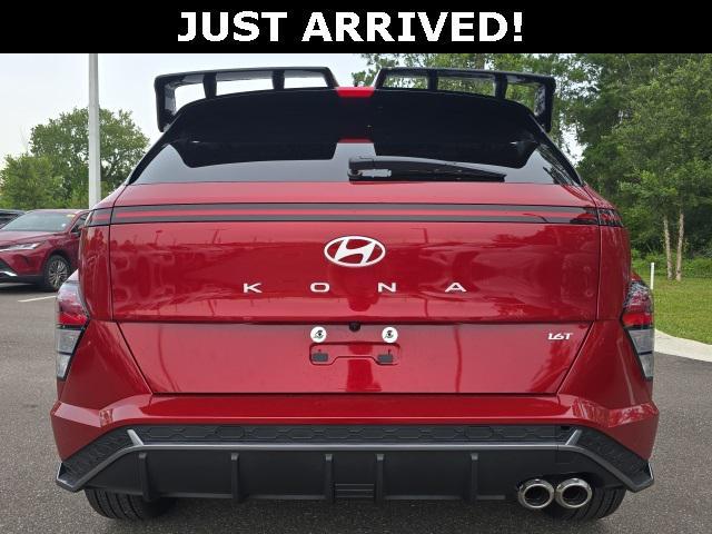 Photo of 2025 Ultimate Red Metallic w/Black Roof Hyundai KONA