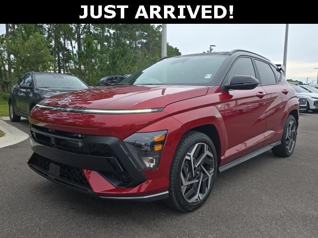 Photo of 2025 Ultimate Red Metallic w/Black Roof Hyundai KONA