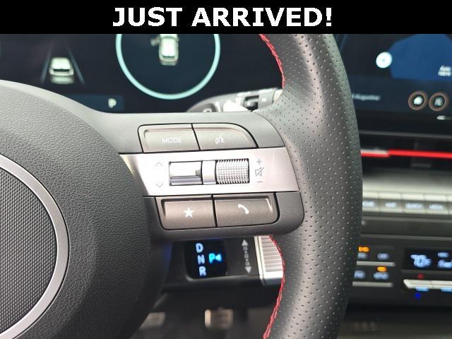 Photo of 2025 Ultimate Red Metallic w/Black Roof Hyundai KONA