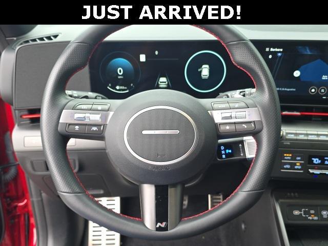 Photo of 2025 Ultimate Red Metallic w/Black Roof Hyundai KONA