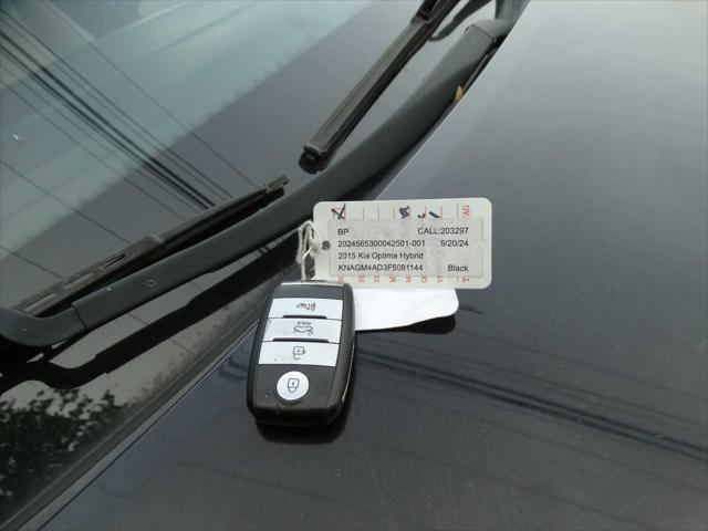 Photo of 2015 Aurora Black Pearl Kia Optima Hybrid
