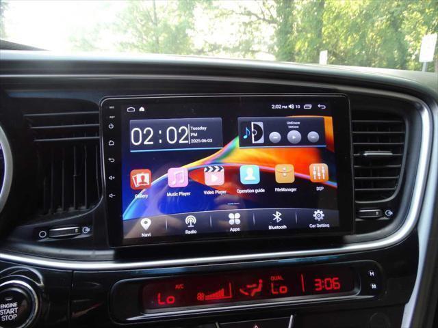 Photo of 2015 Aurora Black Pearl Kia Optima Hybrid