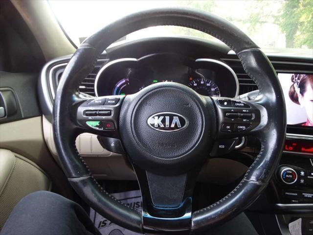 Photo of 2015 Aurora Black Pearl Kia Optima Hybrid