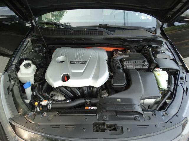 Photo of 2015 Aurora Black Pearl Kia Optima Hybrid