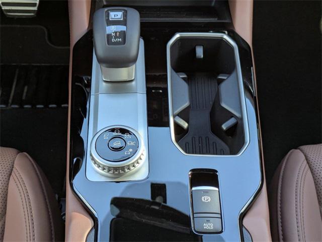 Photo of 2025 Red Diamond With Black Roof Mitsubishi Outlander