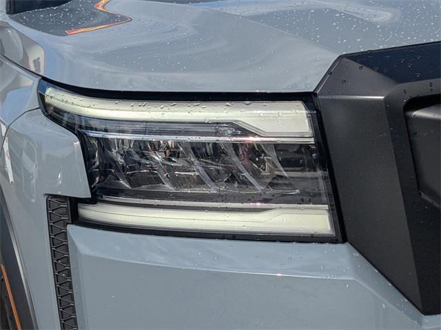 Photo of 2023 Boulder Gray Pearl Nissan Frontier