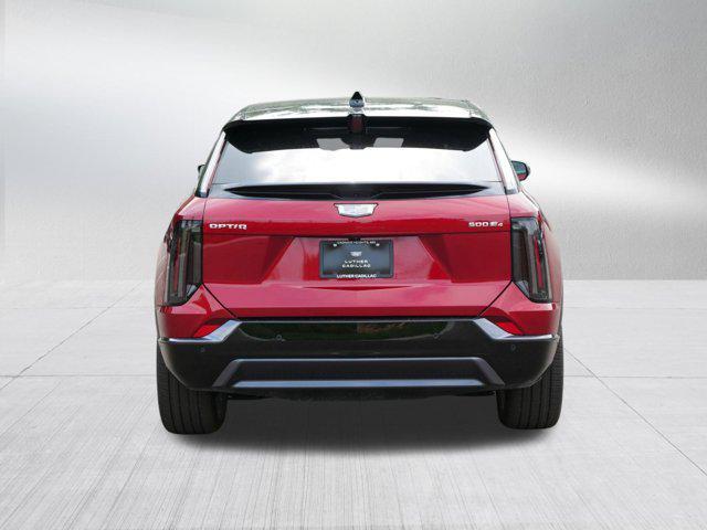 Photo of 2025 Radiant Red Tintcoat Cadillac OPTIQ