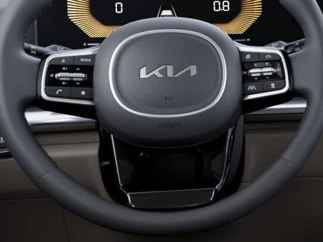 Photo of 2026 Deep Chroma Blue Kia Carnival Hybrid