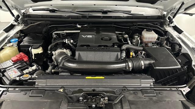 Photo of 2023 Glacier White Nissan Frontier