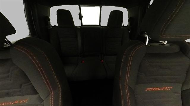 Photo of 2023 Glacier White Nissan Frontier
