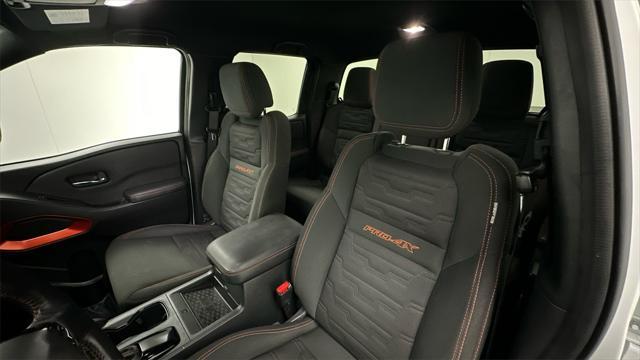 Photo of 2023 Glacier White Nissan Frontier