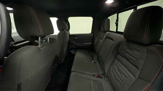 Photo of 2023 Glacier White Nissan Frontier