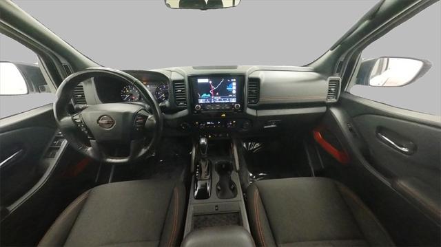 Photo of 2023 Glacier White Nissan Frontier