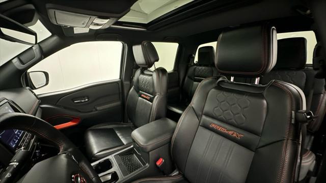 Photo of 2025 Boulder Gray Pearl Nissan Frontier