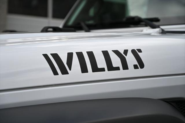 Photo of 2021 Bright White Clearcoat Jeep Wrangler Unlimited