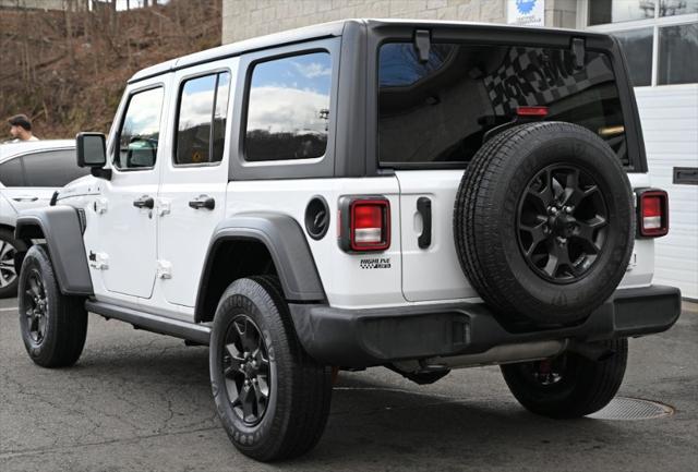 Photo of 2021 Bright White Clearcoat Jeep Wrangler Unlimited