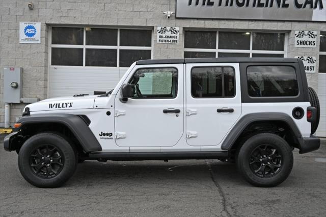 Photo of 2021 Bright White Clearcoat Jeep Wrangler Unlimited