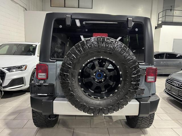 Photo of 2014 Anvil Clear Coat Jeep Wrangler Unlimited