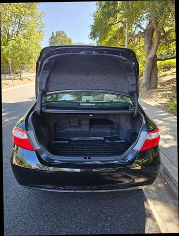 Photo of 2015 Black Toyota Camry Hybrid
