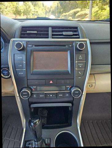 Photo of 2015 Black Toyota Camry Hybrid