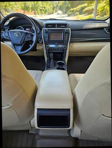 Photo of 2015 Black Toyota Camry Hybrid