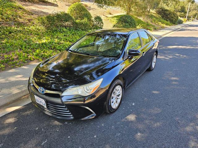 Photo of 2015 Black Toyota Camry Hybrid
