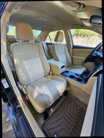 Photo of 2015 Black Toyota Camry Hybrid