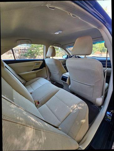 Photo of 2015 Black Toyota Camry Hybrid