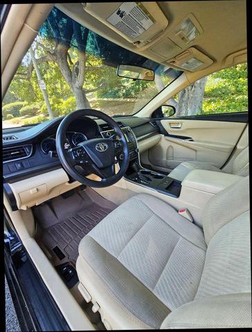 Photo of 2015 Black Toyota Camry Hybrid