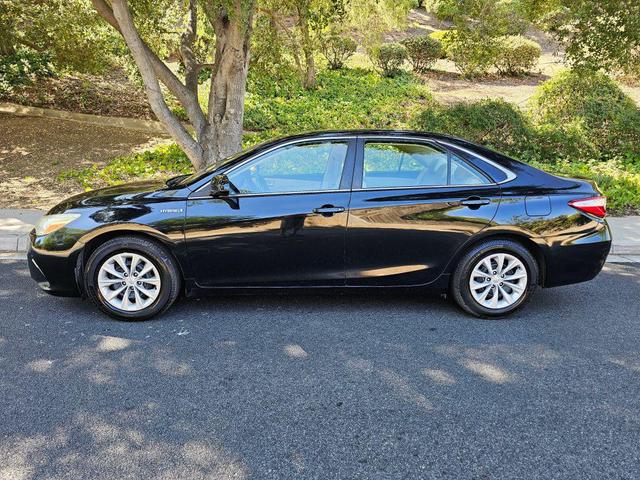 Photo of 2015 Black Toyota Camry Hybrid