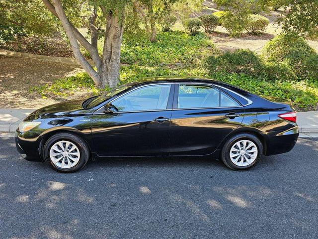Photo of 2015 Black Toyota Camry Hybrid