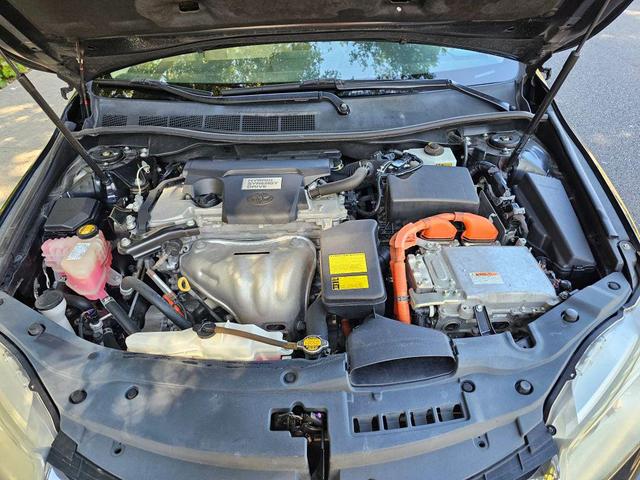Photo of 2015 Black Toyota Camry Hybrid