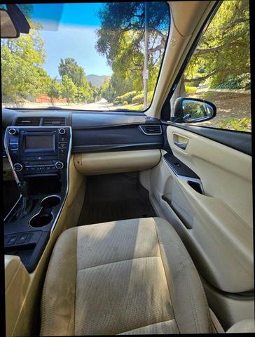 Photo of 2015 Black Toyota Camry Hybrid