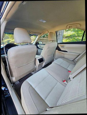 Photo of 2015 Black Toyota Camry Hybrid