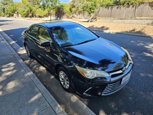 Photo of 2015 Black Toyota Camry Hybrid
