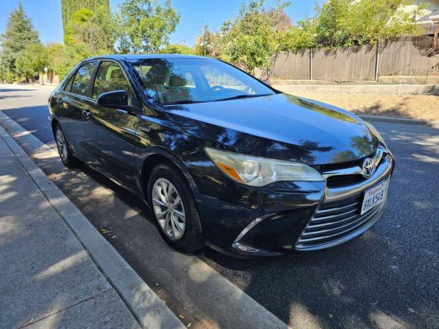 Photo of 2015 Black Toyota Camry Hybrid