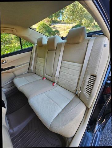 Photo of 2015 Black Toyota Camry Hybrid