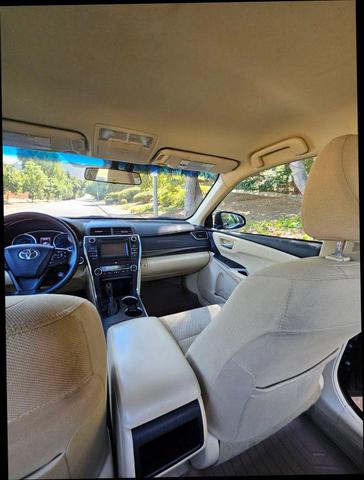 Photo of 2015 Black Toyota Camry Hybrid