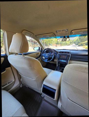 Photo of 2015 Black Toyota Camry Hybrid