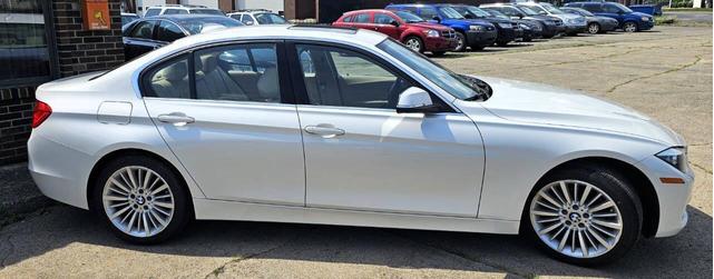 Photo of 2014 White BMW 328