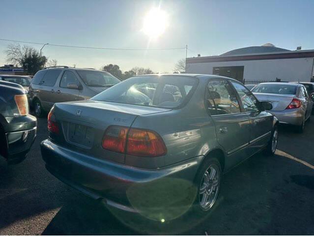 Photo of 2000 Iced Teal Pearl Honda Civic